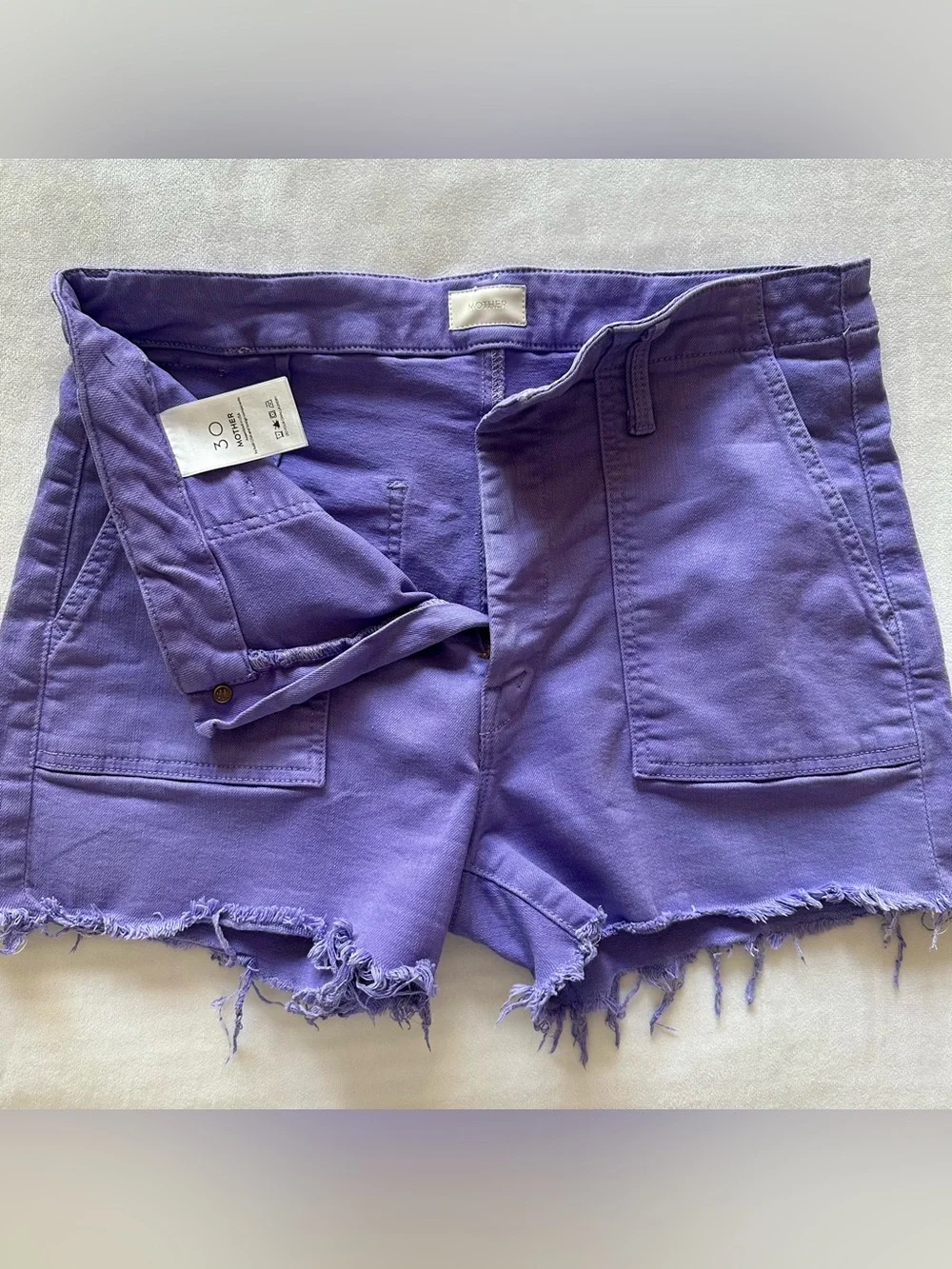 mother denim purple denim cut off shorts / size 30
